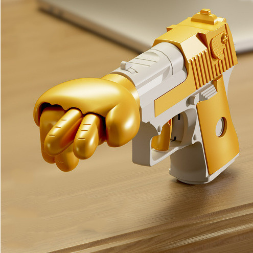 Spring-Loaded Punch Gun Gag Toy — photo 2