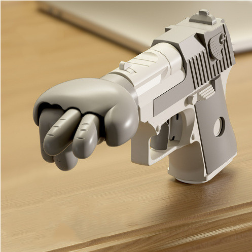 Spring-Loaded Punch Gun Gag Toy — photo 6